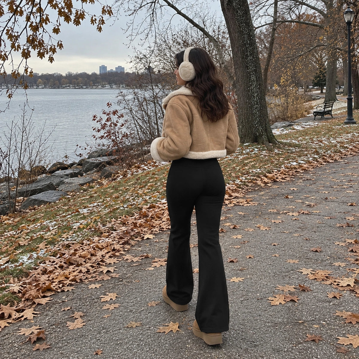 Mira fleece-lined bootcut pants on an autumn lakeside walk