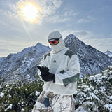 Man adjusting gloves in the snowy mountains