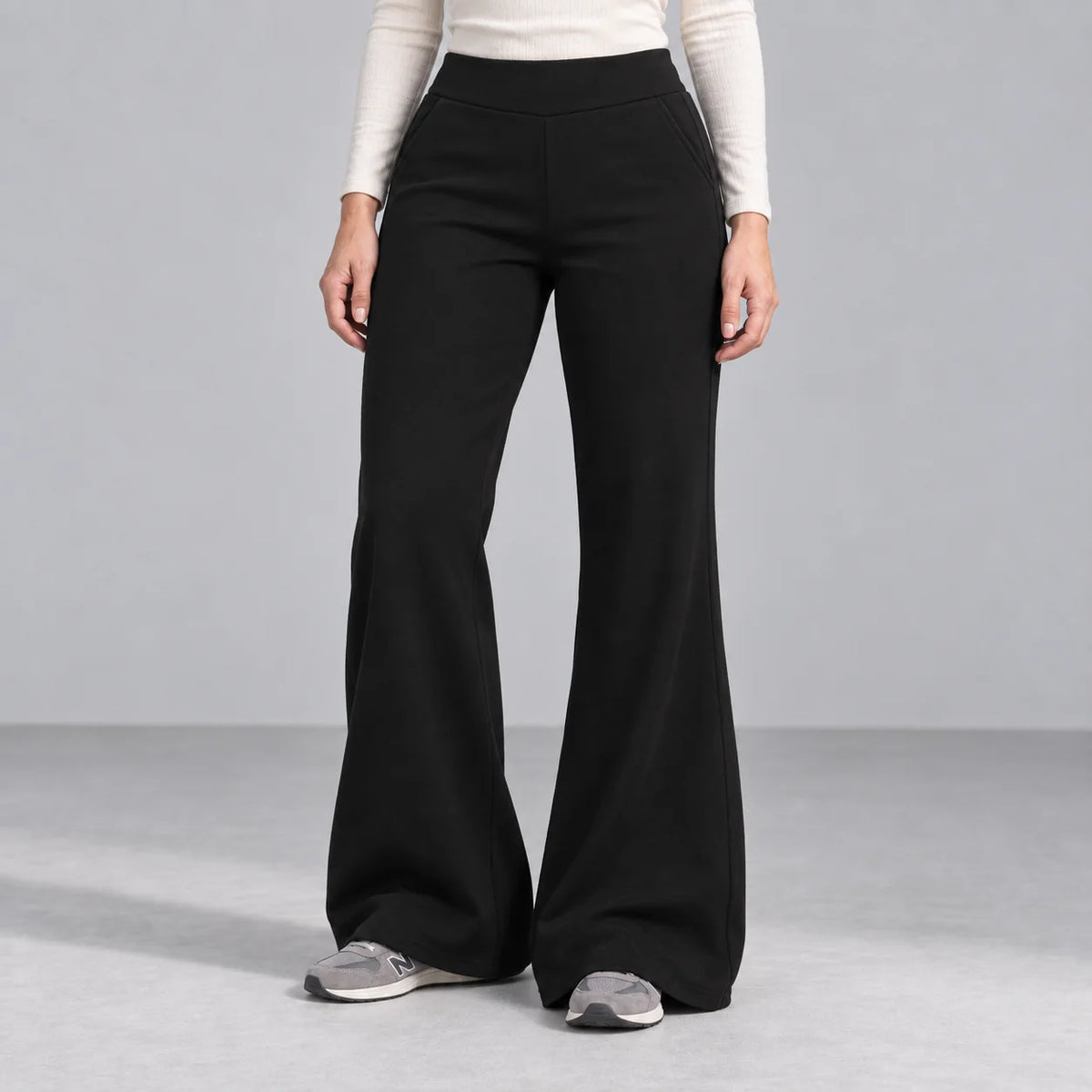 Mira black fleece-lined bootcut pants — front view