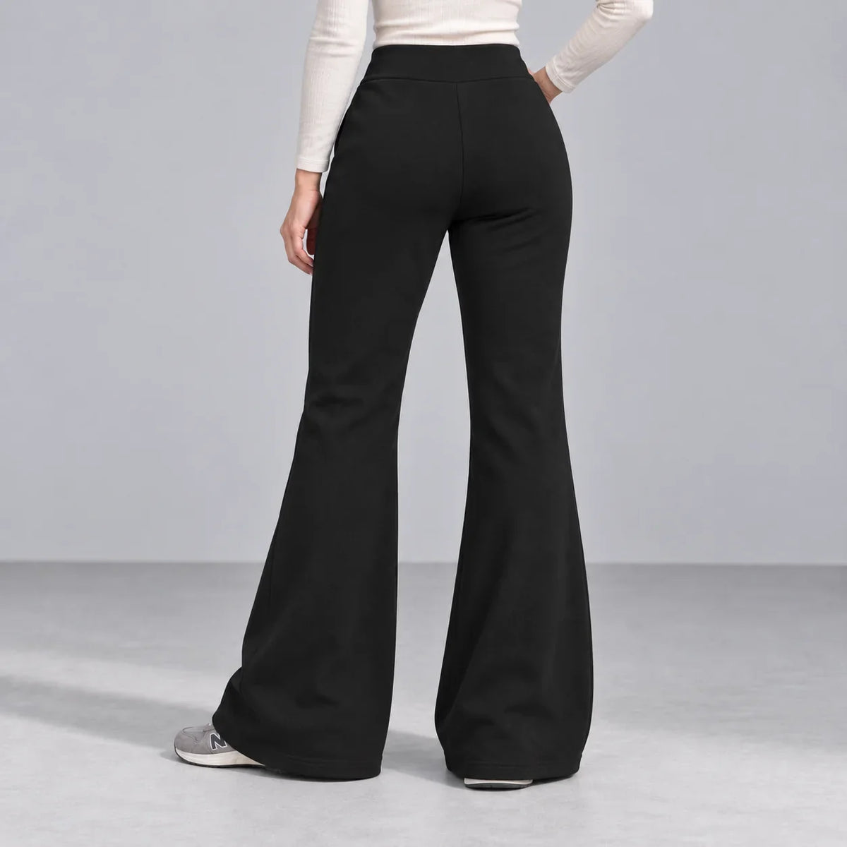 Mira black fleece-lined bootcut pants — back view