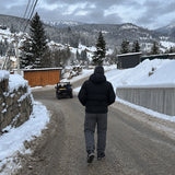 Summit Thermal Pants in grey on a snowy winter road